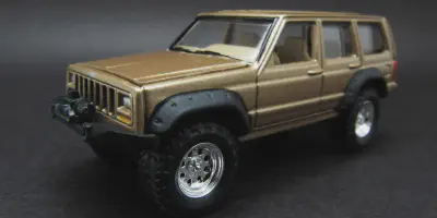 /img/47730-jeep-wrangler-jk-diecast-display.webp